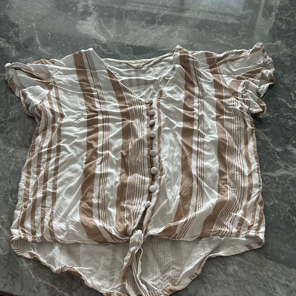 Girls large button down white and tan shirt
